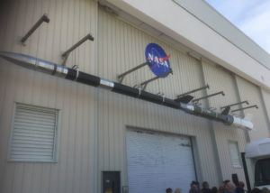 Outside of a building with a NASA logo on it.