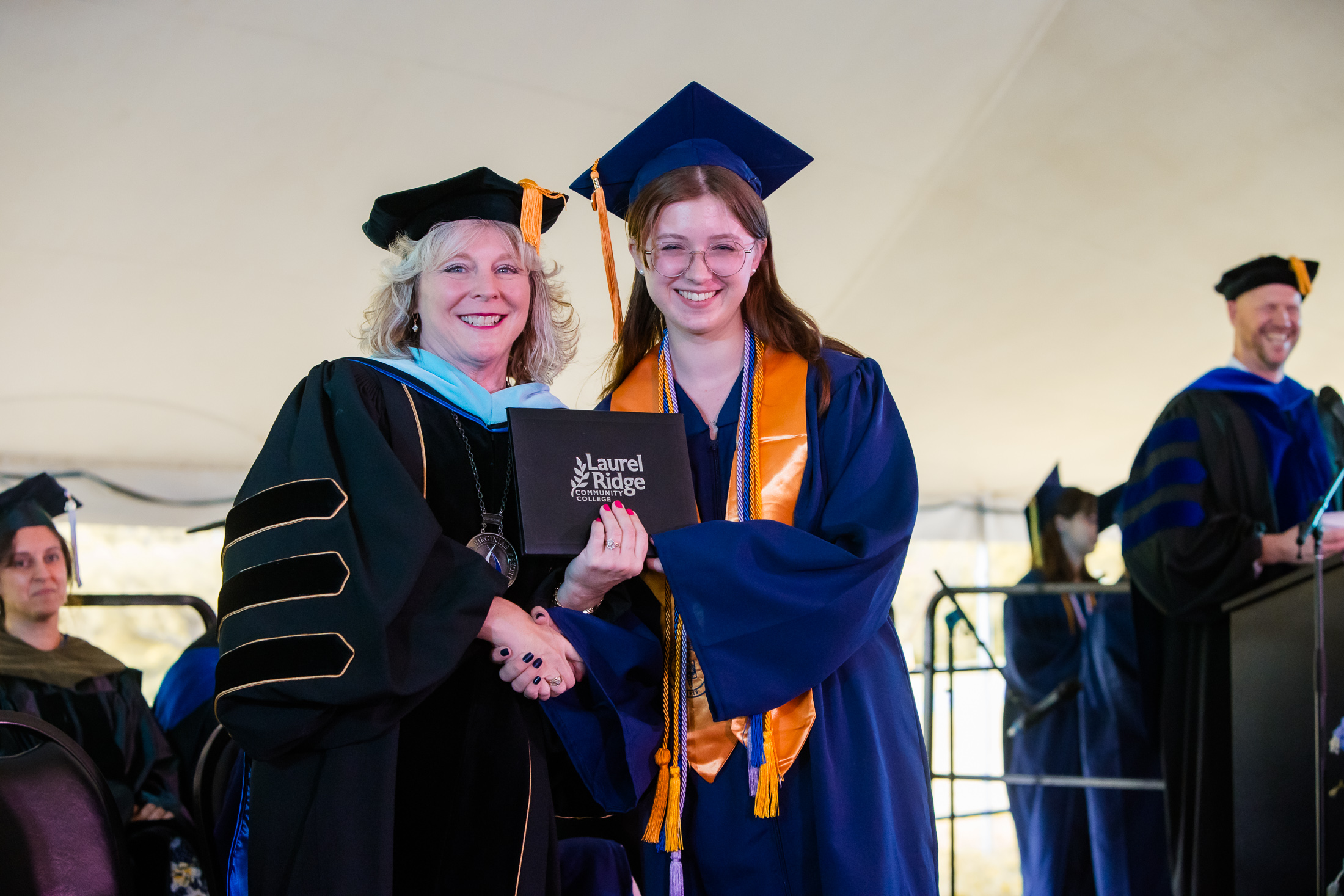 Spangler receiving diploma