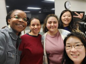 group of diverse smiling students