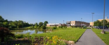 campus by pond photo