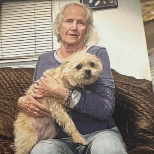 Carol with dog on her lap