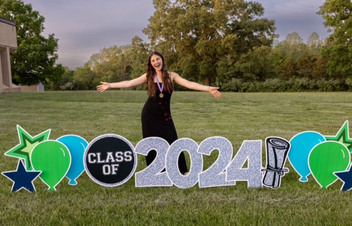 Kozhenevsky posing with "Class of 2024" sign