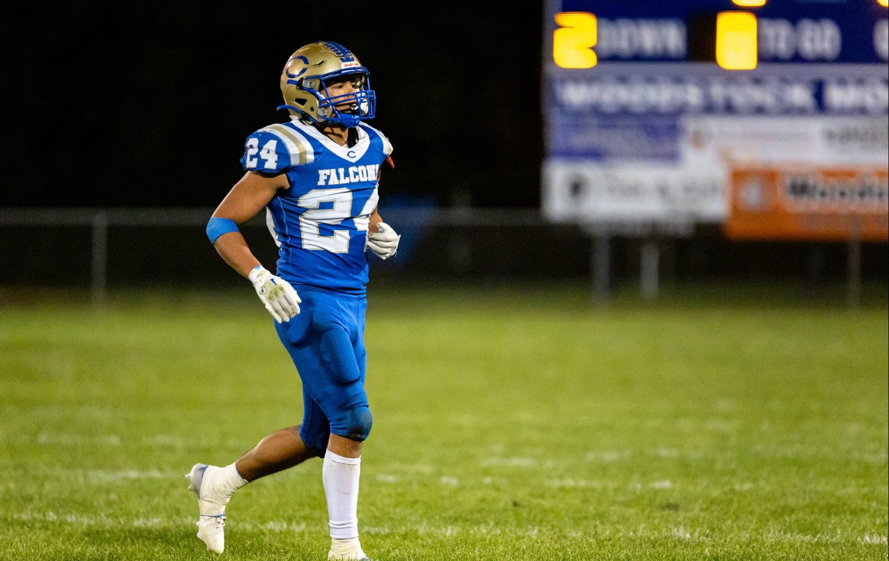 Hecker on football field