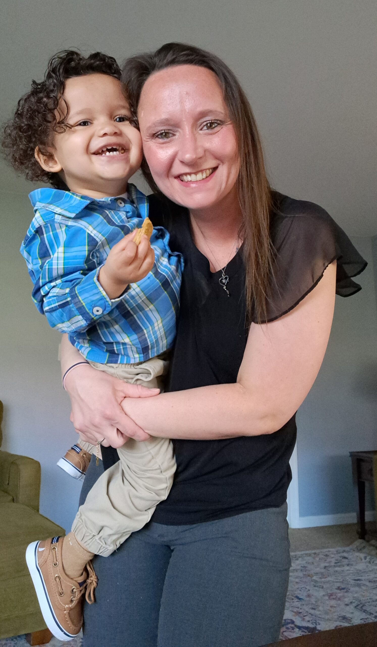 Woman holding small child
