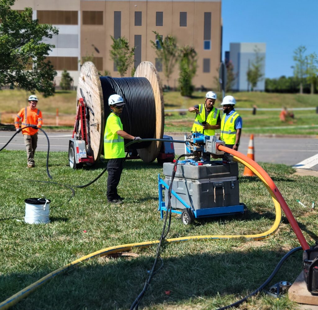 fiber optic cable workers
