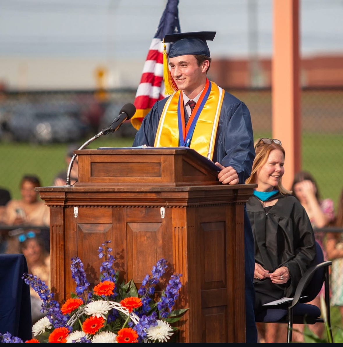 Photo of Morris speaking at podium