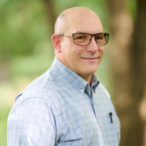 headshot photograph of jon levi