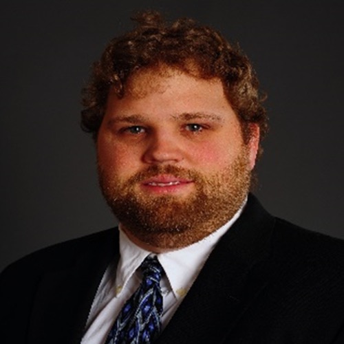 headshot photograph of RJ