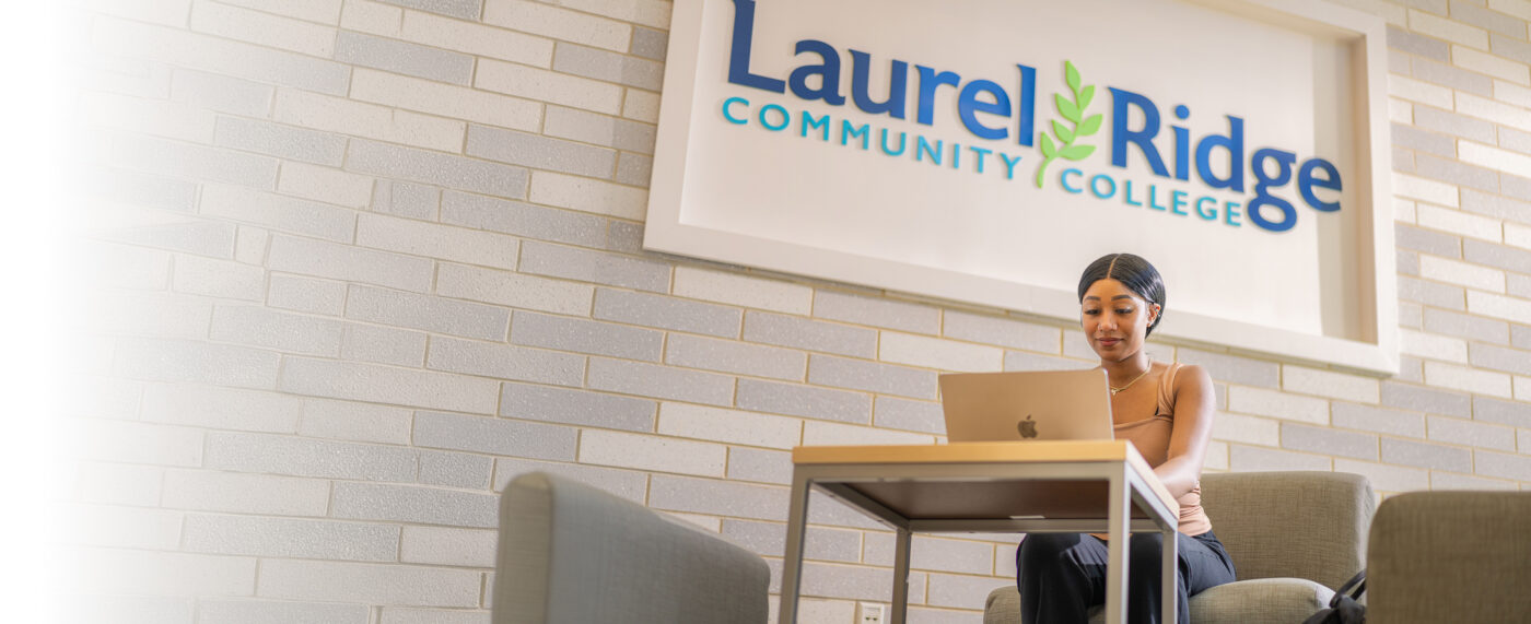 smiling woman using computer laptop