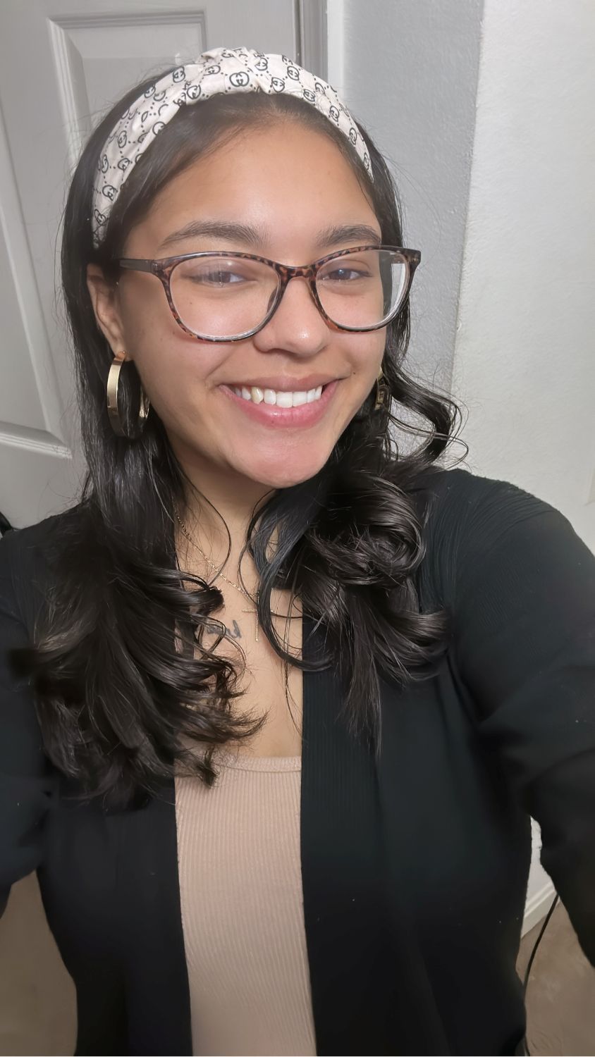 Headshot of a smiling Monica Thompson