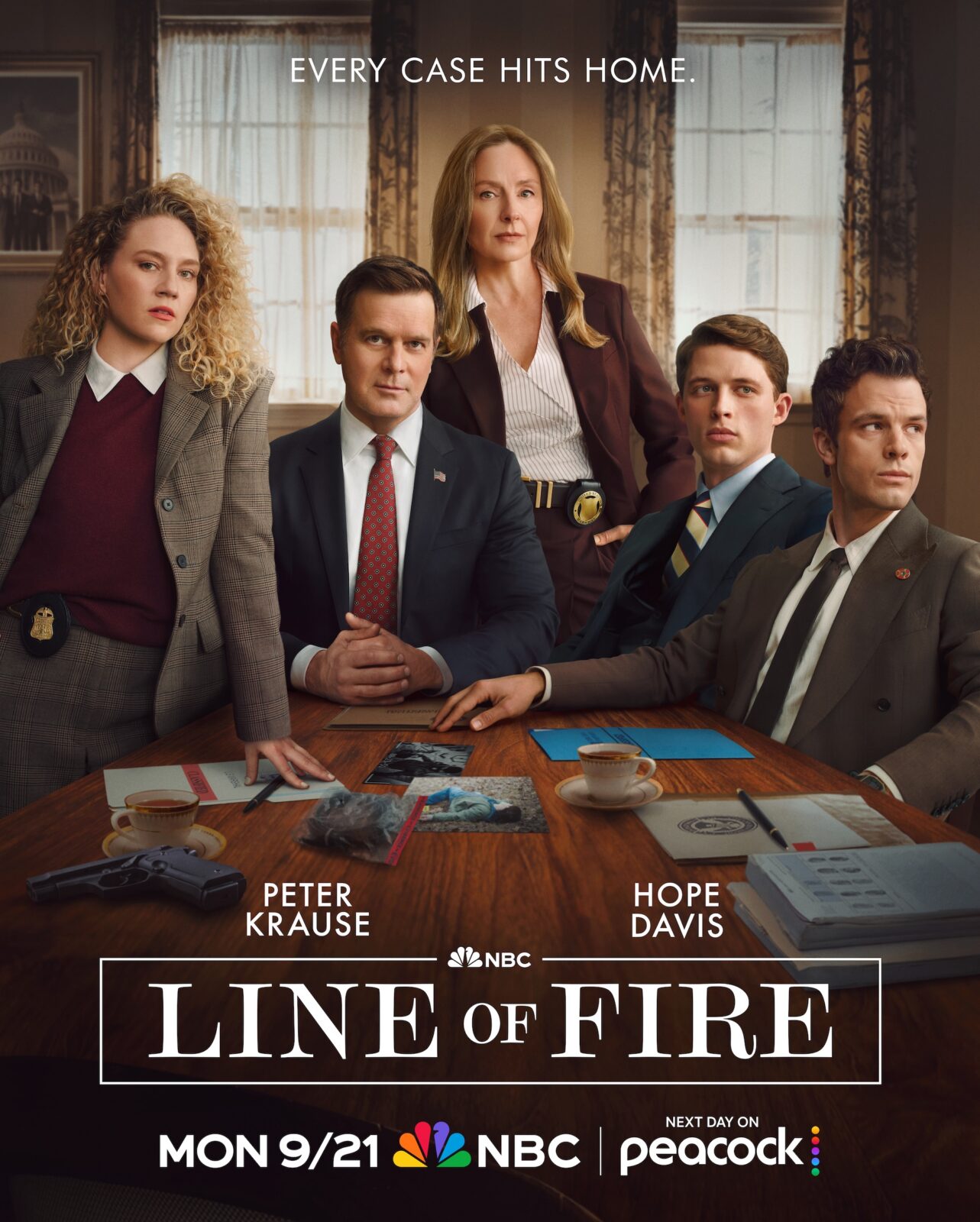 Promotional poster for NBC's Line of Fire featuring five investigators gathered around a conference table with case files, photos, a handgun, and coffee cups. Text reads “Every Case Hits Home” and promotes the series premiere on NBC and Peacock.